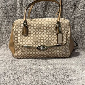 Tan and beige coach purse
